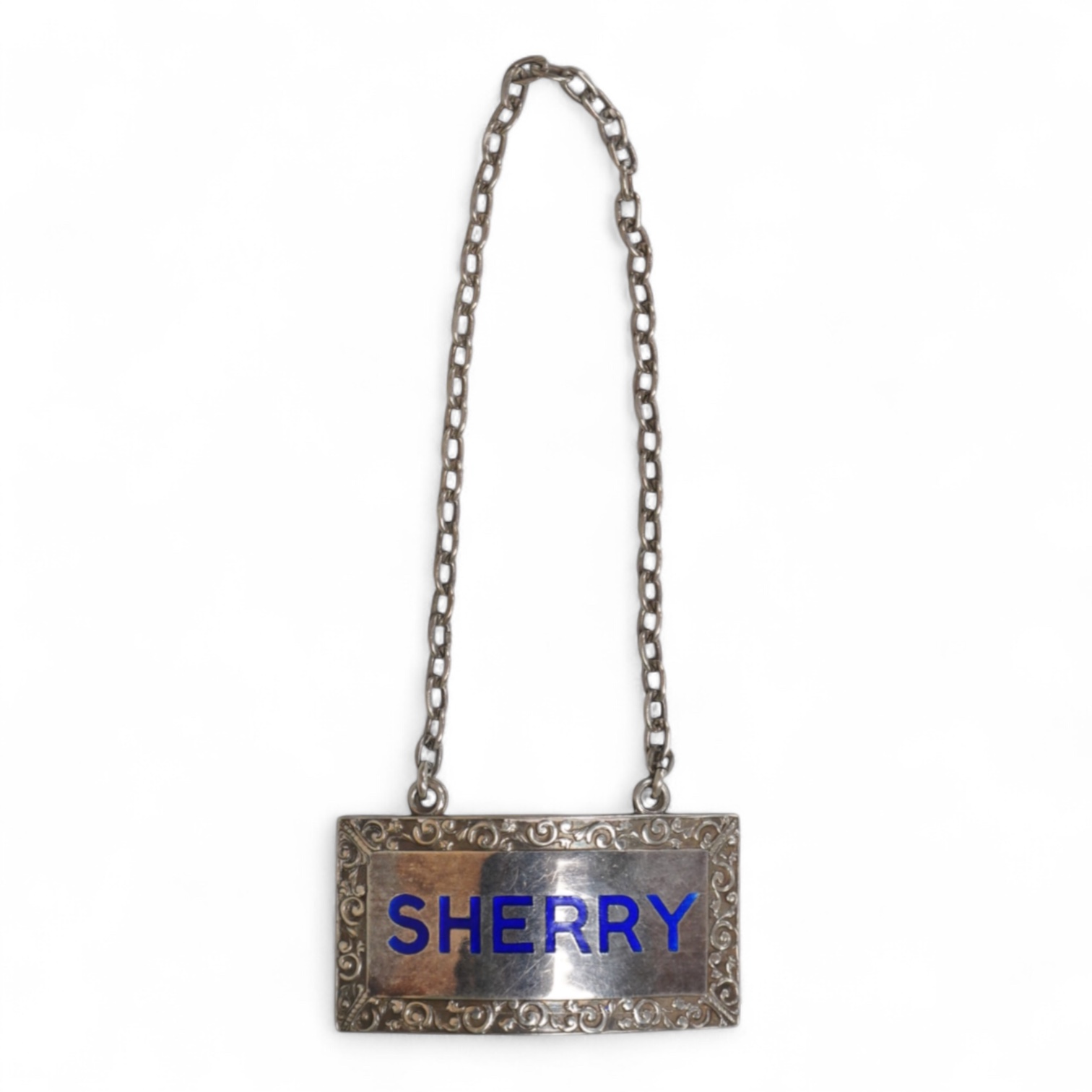An Elizabeth II silver and blue enamel 'Sherry' wine label, by Mappin & Webb, Birmingham, 1969, width 45mm.